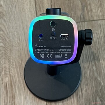 Bottom: 3.5mm headphone jack, power/RGB button, noise suppression button, USB-C charging/connection