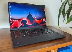 The Lenovo ThinkPad X1 Carbon Gen 12 OLED has become much cheaper thanks to a mentionable Black Friday deal (Image source: Allen Ngo)