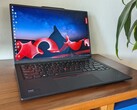 The Lenovo ThinkPad X1 Carbon Gen 12 OLED has become much cheaper thanks to a mentionable Black Friday deal (Image source: Allen Ngo)