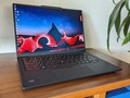 The Lenovo ThinkPad X1 Carbon Gen 12 OLED has become much cheaper thanks to a mentionable Black Friday deal (Image source: Allen Ngo)
