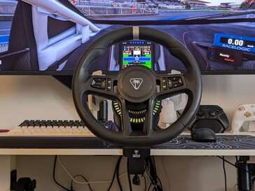 Steering wheel aligned with cockpit view in Assetto Corsa Competizione.