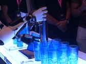 Optimus poured beer with human assistance (Image source: Tesla)