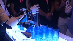 Optimus poured beer with human assistance (Image source: Tesla)