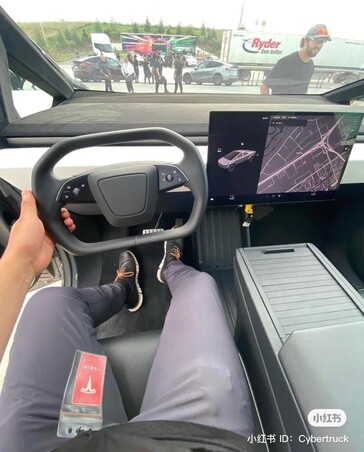 Sitting in the driver's seat of the Cybertruck reveals a rather large dash and a redesigned steering yoke. (Image source: Cybertruck Owners Club)