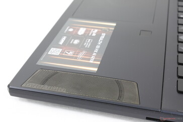 Large grilles on the palm rests for the up-firing speakers