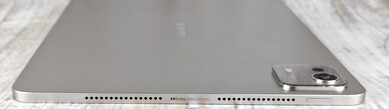 Left case side (on/off button, speaker)