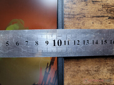Very narrow side bezels but with a much thicker chin bezel