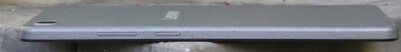 right side of the housing (buttons: volume,. on/off)