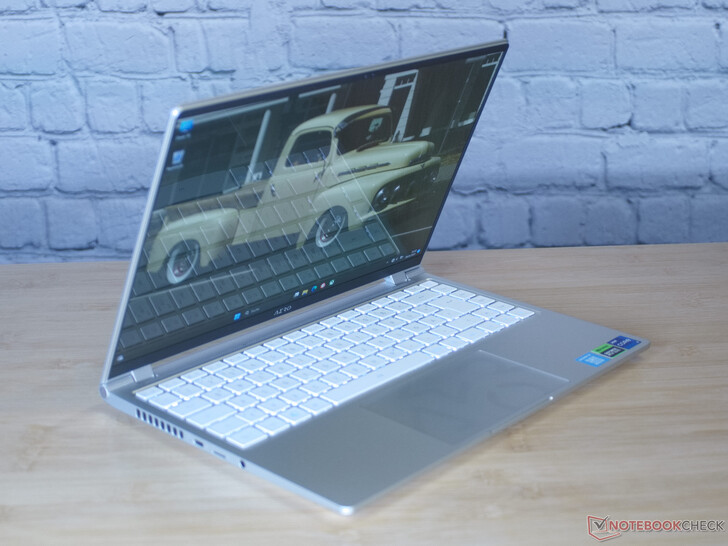 Reflection of the laptop's own keyboard under studio lighting and at 62% screen brightness