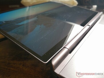 Edge-to-edge Gorilla Glass 5 glossy cover. There are no OLED or other options