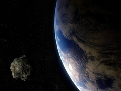 An artist’s illustration showing an asteroid and the Earth. (Image source: Batman111 - Pixabay)