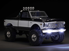 An image of the Axial SCX24 crawler against a dark background.
