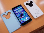 LG DM-01G Android smartphone with custom Swarovski-Mickey Mouse cover
