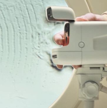 The Polaroid Flip uses ultrasonic sound to select the ideal lens for proper focus. A tripod mount can be used to eliminate blur during long expsoures. (Image source: Polaroid)
