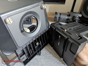Mounting plate attached to the teleprompter with a screw