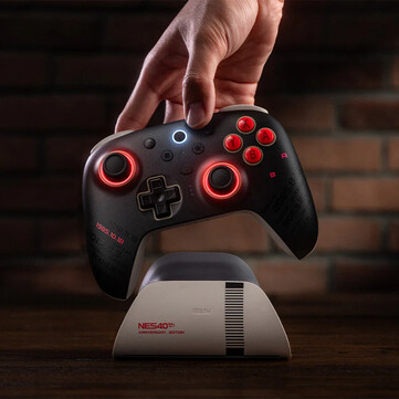 The 8BitDo Ultimate 2 Bluetooth - NES 40th Limited Edition has a custom paint job with notable dates printed on it. (Image source: 8BitDo)