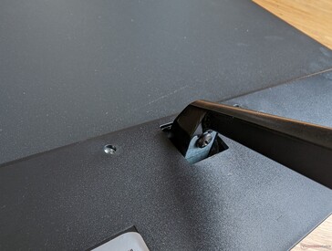 Just a single small screw attaches the arm to the monitor