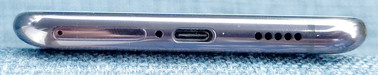 Bottom: SIM slot, microphone, USB-C, speaker