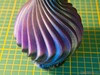 The PLA Burnt Titanium filament is quite appealing