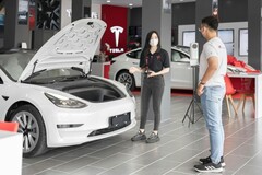 Tesla Model 3 in a dealership (Source: Pexels)