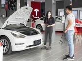 Tesla Model 3 in a dealership (Source: Pexels)