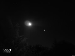 Bright objects, such as the moon and stars, appear brighter in the night vision mode than in the standard shooting mode.