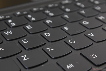 Key feedback is very shallow and light even for an Ultrabook. Fingerprints accumulate readily on the keys and glass clickpad