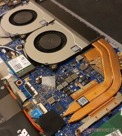 Two fans and two heat pipes within the office laptop with an RTX graphics card