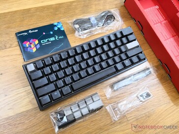 Box includes extra keycaps, keycap remover, USB-C to USB-A cable, and user manual. All RGB color controls can be found in the manual