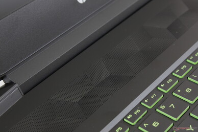 Stylized speaker grilles along the top Stylized speaker grilles along the top