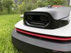 The camera and LED form a grinning face