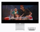 The image shows the new M6 Mac mini next to a Studio display. Some sort of a movie is being played