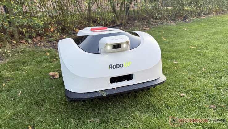 At the edge of the lawn, the robotic lawnmower randomly turns onto the next path
