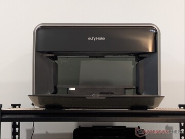 eufyMake E1 UV printer with front door open.
