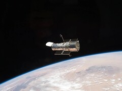 An image of Hubble space telescope in Earth's orbit (Image source: NASA; cropped)