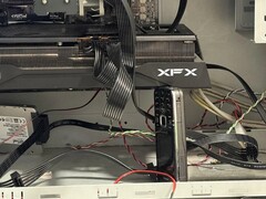 A Reddit user is propping up the graphics card in his PC with an old Nokia 6124 Classic. (Image source: u/bulochklem via Reddit)