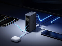 The Spacemate RD1 has a built-in GaN power supply. Pictured: a promo picture showing the dock charging multiple devices.