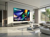 The Hisense 116UXS TV (pictured hanging on a wall of a living room) is on show at CES 2026. (Image source: Hisense)