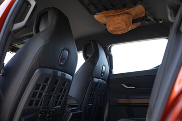 The interior of the Fisker Alaska is chock-full of straps and alternative luggage storage solutions. (Image source: Fisker)