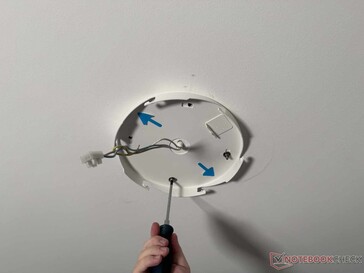 Drill holes, screw the mounting plate to the ceiling...