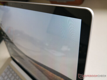 Exact same edge-to-edge glass touchscreen on all SKUs