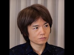 Masahiro Sakurai head shot (Image source: https://www.youtube.com/watch?v=R4iBFYbBGgg, CC BY 3.0 <https://creativecommons.org/licenses/by/3.0>, via Wikimedia Commons)