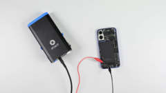 Zapping the iPhone 16&#039;s battery glue away. (Image source: iFixit)
