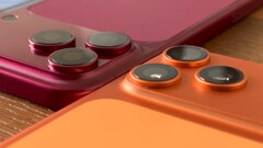 A plastic model of the iPhone 18 Pro Max in a side-by-side comparison with the iPhone 17 Pro Max and matching cases.