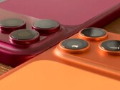 A plastic model of the iPhone 18 Pro Max in a side-by-side comparison with the iPhone 17 Pro Max and matching cases.