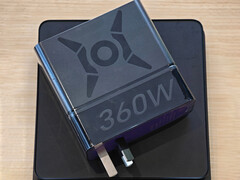The Honor Win 360W laptop charger is said to be compatible with multiple laptops. Pictured: the adapter on top of a weight scale.
