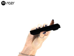The teased folding phone was shown with a matte black finish.