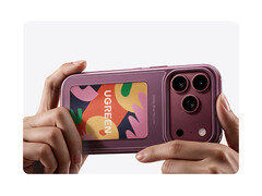 The Magic E-Ink phone case is available in three colors. Pictured: the accessory being attached to the iPhone 18 Pro.
