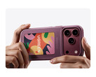 The Magic E-Ink phone case is available in three colors. Pictured: the accessory being attached to the iPhone 18 Pro.
