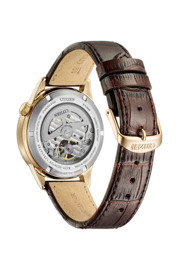 The reverse side of the Citizen watch, showcasing a transparent exhibition case back that reveals the silver-toned automatic movement and rotor.